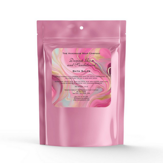 Pink packaging of bath salts with marbled design on a white background
