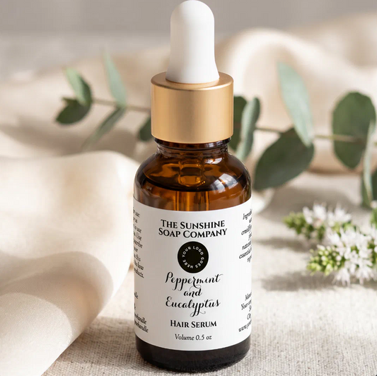 White w curly text and logo dropper bottle label